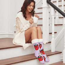 Load image into Gallery viewer, The Foozie™ Marshmallow slipper socks, worn by a woman sitting on the stairs with a mug